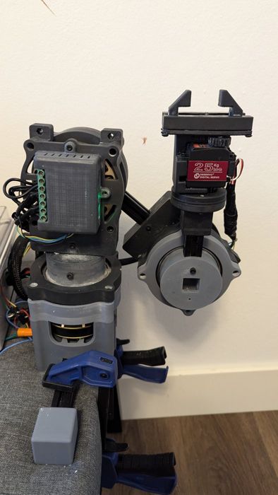 Earlier Romulus arm with a drive enclosure and the SimpleGripper on the wrist.
